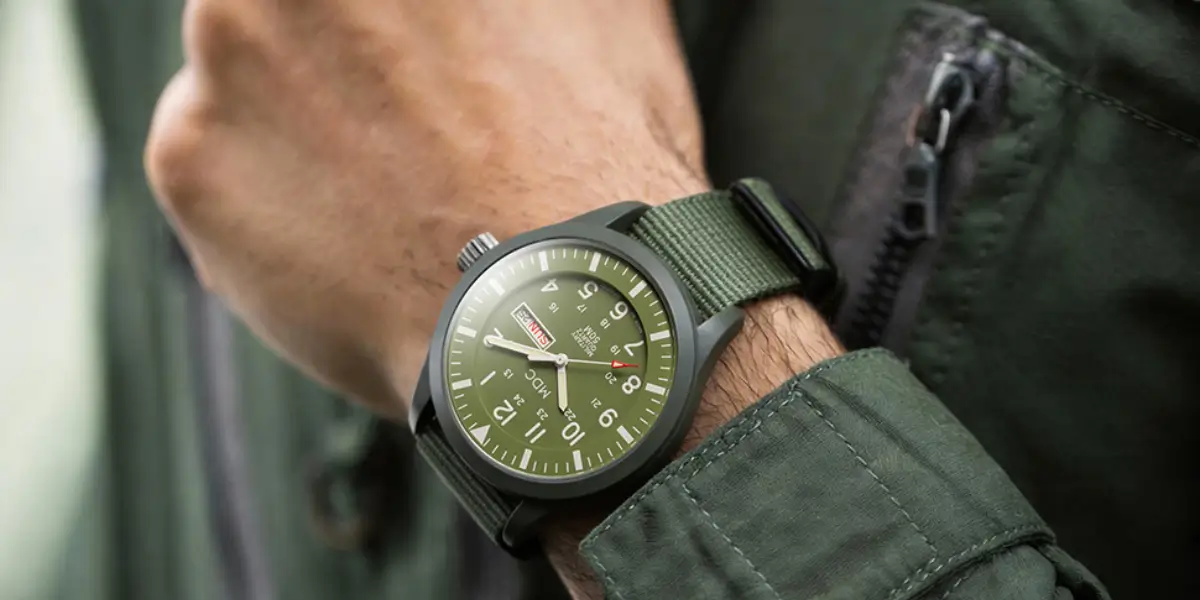 Military-inspired field watch with durable case and fabric strap